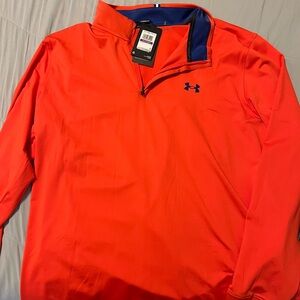 Men’s XXL under armour quarter zip in orange. Never worn.